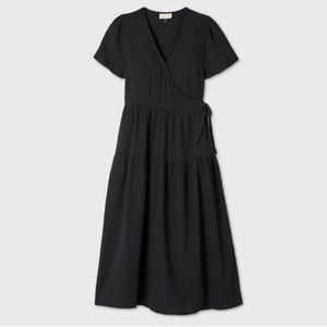 Tiered black wrap dress